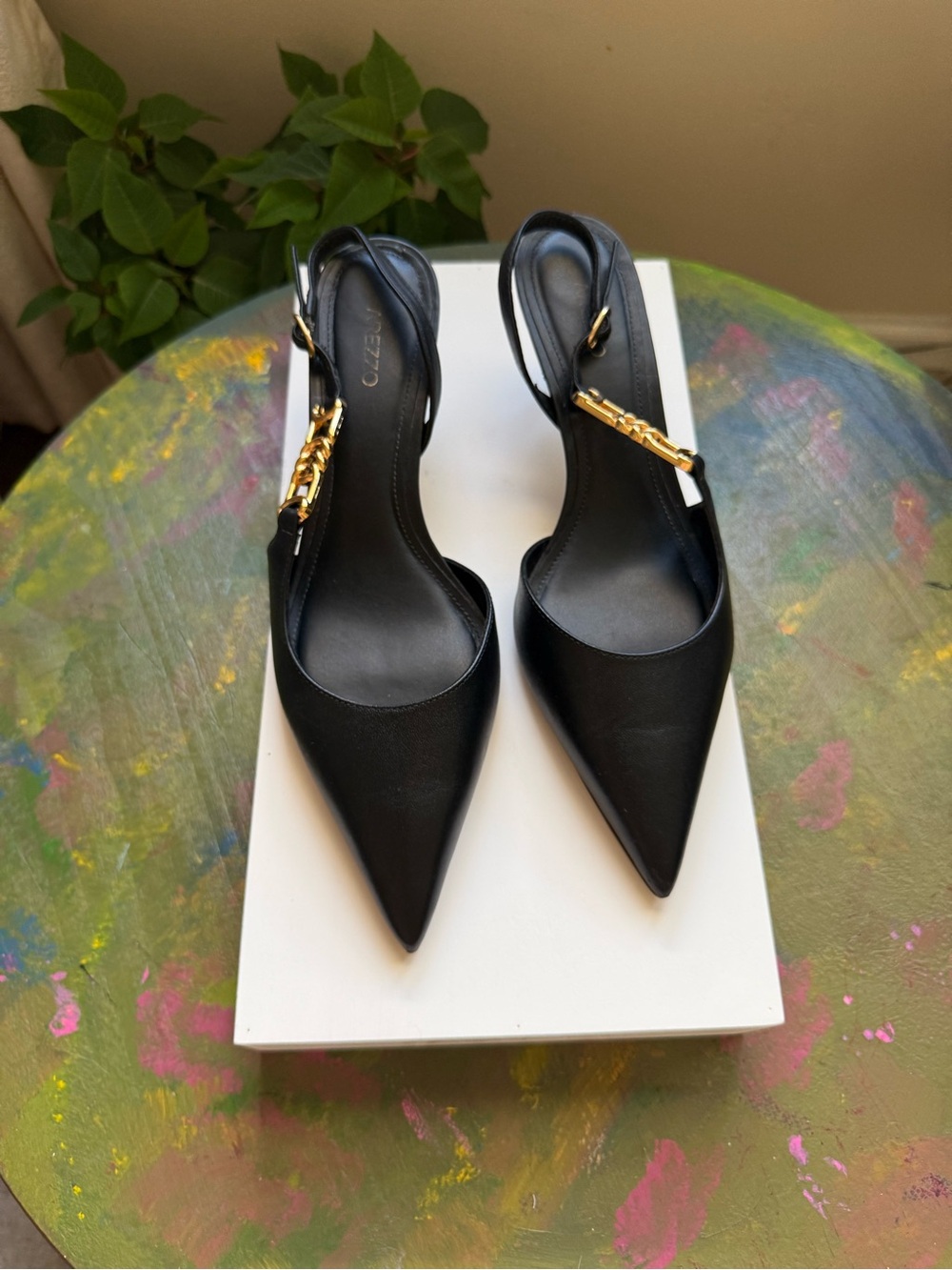 Black Pointed-Toe Slingback Pumps with Gold Chain Accent